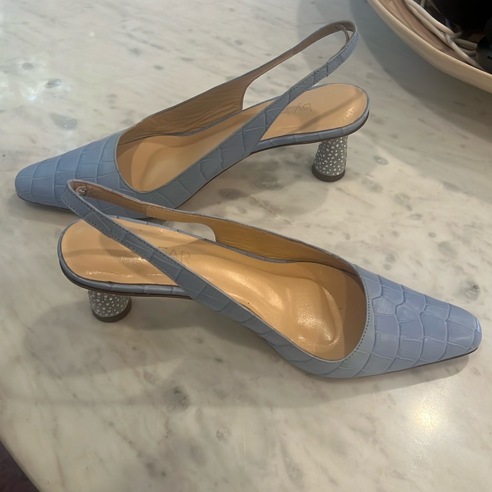 by FAR leather and rhinestone mules! Excell condition.